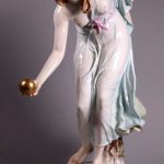 Meissen Porcelain enameled colored Figure of Girl Playing Bowls