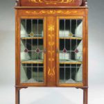 AN ART NOUVEAU MARQUETRY MAHOGANY AND LEADED GLASS SHOWCASE