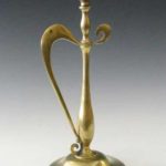 An Art Nouveau brass lamp base