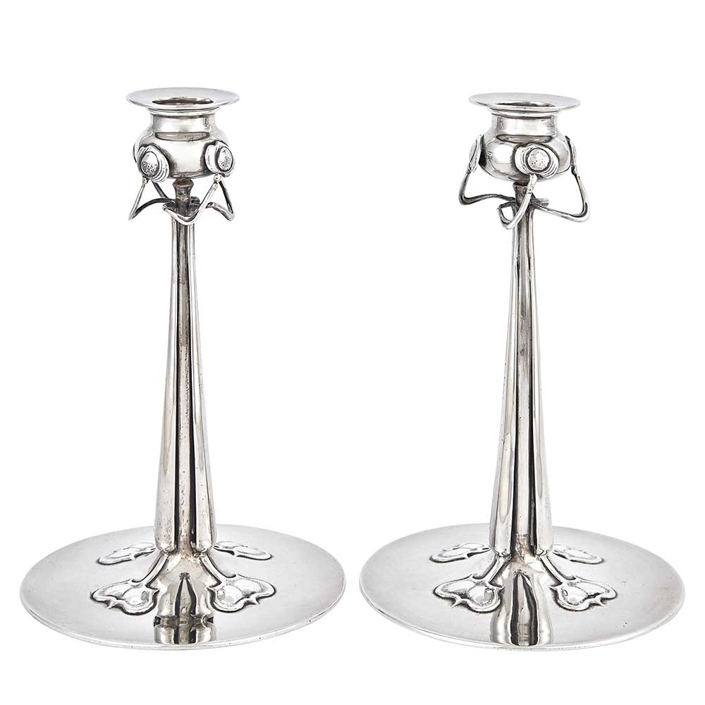 Pair of Liberty and Co. Cymric Pattern Sterling Silver Candlesticks