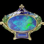 Enamelled gold brooch set with opal