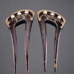 Murrle Bennett & Co. A PAIR OF ART NOUVEAU GOLD AND MOTHER-OF-PEARL MOUNTED TORTOISESHELL COMBS