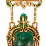 MARCUS & CO. ART NOUVEAU EMERALD, ENAMEL AND DIAMOND WATCH-BROOCH