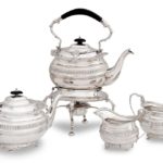 A FOUR PIECE SILVER TEA SERVICE