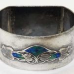 An Art Nouveau silver napkin ring